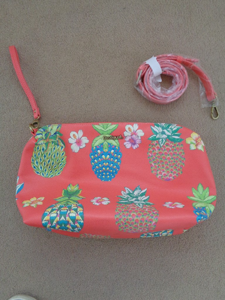 DESIGUAL CORAL AND MULTI PINEAPPLE PRINT WRISTLET BAG WITH SHOULDER STRAP